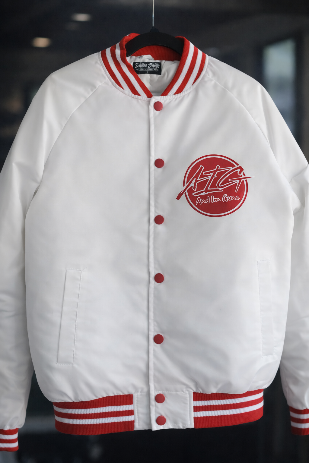 AIG “And I’m Gone™” Varsity Jacket – White/Red Streetwear